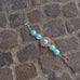 7.5" Reconstituted Turquoise and Coral Sunburst Toggle Bracelet - Matador Diamond