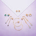 14 Karat Gold Plated Lariat Style Earrings with Chalcedony Drop